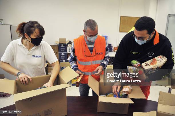 Pubblica Assistenza volunteers prepare solidarity food shopping bags for the coronavirus emergency on April 24, 2020 in Livorno, Italy. Italy will...