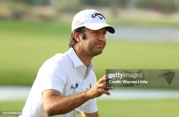 Jorge Campillo of Spain acknowledges the crowd on the 18th green during the third round of the Commercial Bank Qatar Masters at Education City Golf...