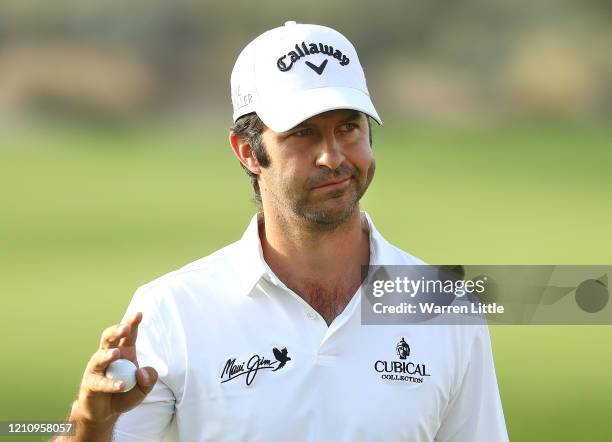 Jorge Campillo of Spain acknowledges the crowd on the 18th green during the third round of the Commercial Bank Qatar Masters at Education City Golf...