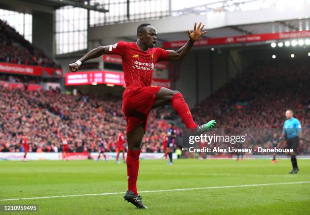 Sadio Mane of Liverpool celebrates after scoring their second goal during the Premier League match between Liverpool FC and AFC Bournemouth at...