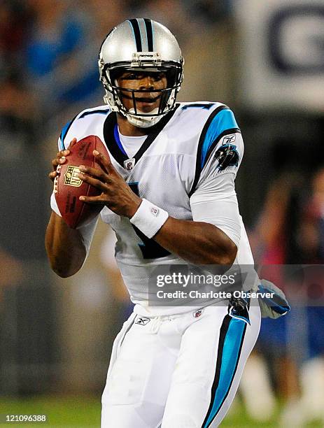 Carolina Panthers rookie quarterback Cam Newton looks downfield during the second quarter against the New York Giants at Bank of America Stadium in...