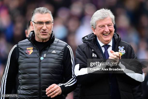 Nigel Pearson, Manager of Watford and Roy Hodgson, Manager of Crystal Palace react prior to the Premier League match between Crystal Palace and...