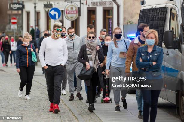 Protesters wearing protective masks march on the street as they take part during the demonstration. Hundreds of polish-Germany border residents...