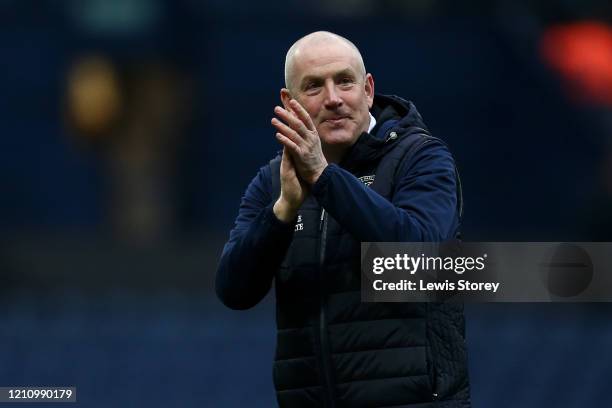 Mark Warburton, manager of Queens Park Rangers celebrates his sides victory following the Sky Bet Championship match between Preston North End and...