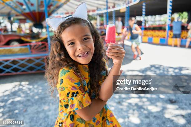 brazilian girl eating ice cream - hot latino girl stock pictures, royalty-free photos & images