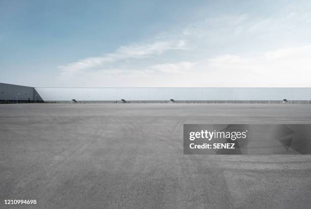 empty parking lot - asphalt stock pictures, royalty-free photos & images