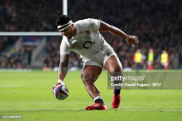 Manu Tuilagi of England touches down to score his sides third try during the 2020 Guinness Six Nations match between England and Wales at Twickenham...