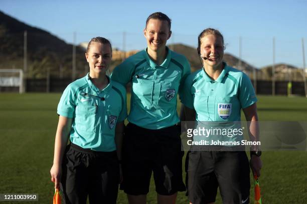 Referee Minka Vekkeli , assistant referee Heini Hyvonen and assistant referee Viola Viiri pose after the U19 Women's Tournament match between Germany...