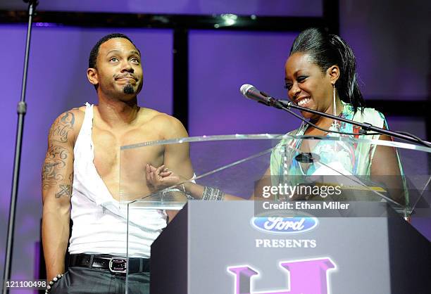 Personality Terrence Jenkins and actress Tichina Arnold onstage during the ninth annual Ford Hoodie Awards at the Mandalay Bay Events Center August...