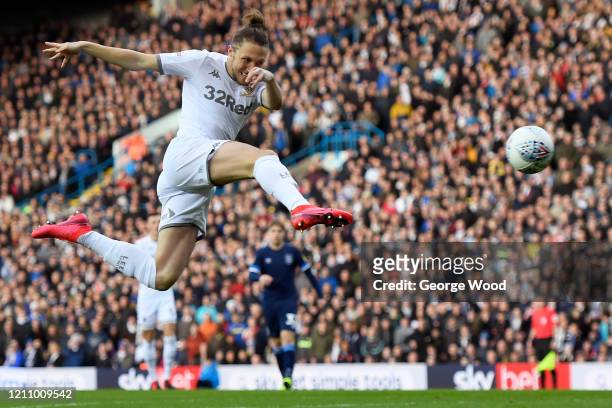 Luke Ayling of Leeds United scores his side's first goal during the Sky Bet Championship match between Leeds United and Huddersfield Town at Elland...