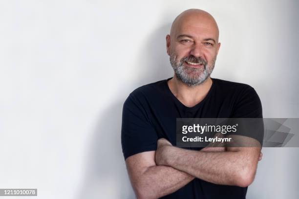 portrait of a handsome man, smiling. - hair loss stock pictures, royalty-free photos & images