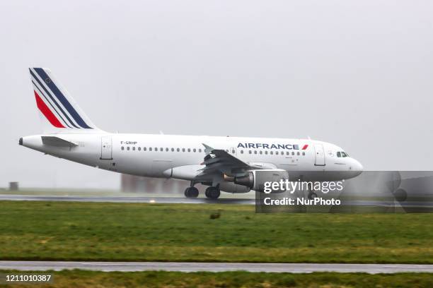 Air France Airbus A319 commercial aircraft landing and taxiing at Polderbaan runway in Amsterdam Schiphol AMS EHAM international airport in The...