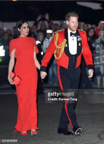 Prince Harry, Duke of Sussex and Meghan, Duchess of Sussex attend the Mountbatten Festival of Music at Royal Albert Hall on March 07, 2020 in London,...