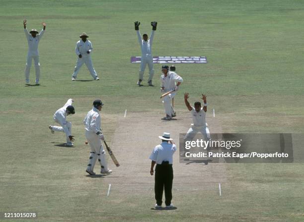 England opener Mike Atherton is out LBW for 33 runs to Chaminda Vaas of Sri Lanka during the 1st Test match between Sri Lanka and England at the...