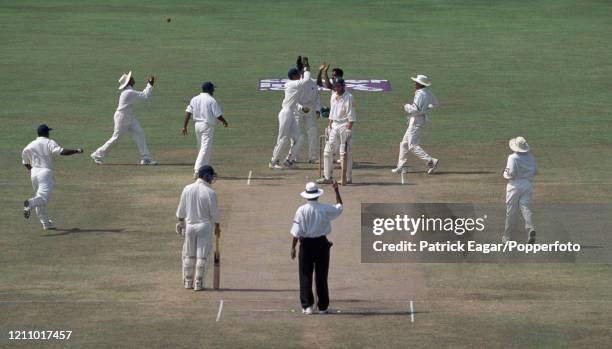 England batsman Mike Atherton is caught for 44 runs by Sri Lanka's wicketkeeper Kumar Sangakkara off the bowling of Chaminda Vaas during the 1st Test...