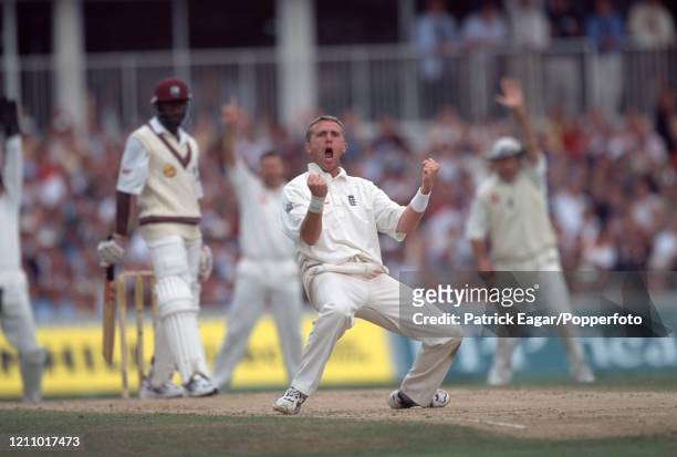 Dominic Cork of England celebrates the wicket of West Indies batsman Wavell Hinds, LBW for 2 runs, during the 5th Test match between England and West...