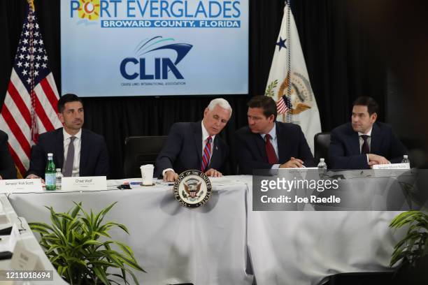 Chad F. Wolf, the acting Secretary of Homeland Security, Vice President Mike Pence, Florida Governor Ron DeSantis and Sen. Marco Rubio sit together...