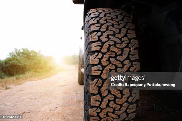 off-road travel on mountain road - mud truck stock pictures, royalty-free photos & images