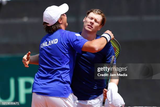 Henri Kontinen and Harri Heliovaara of Finland celebrate during the third match as part of day 2 of Davis Cup World Group I Play-offs at Club...