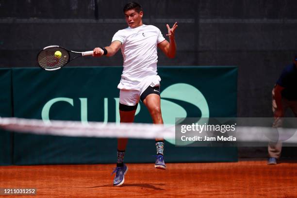 Gerardo Lopez Villaseñor of Mexico returns the ball during the fourth match as part of day 2 of Davis Cup World Group I Play-offs at Club Deportivo...