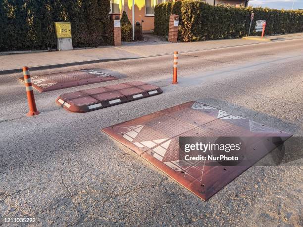 Speed bump called in Poland sleeping policeman on the road near the primary school is seen in Gdansk, Poland on 26 April 2020