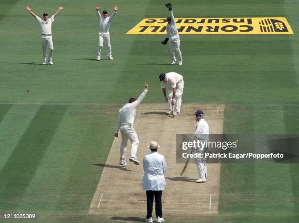 England batsman Graeme Hick is out LBW for 101 to Heath Streak of Zimbabwe during the 1st Test match between England and Zimbabwe at Lord's Cricket...