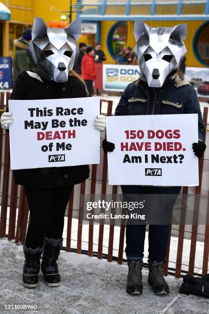 Activists of the animal rights organization PETA protest against the use of dogs in racing ahead of the ceremonial start of the 2020 Iditarod Sled...
