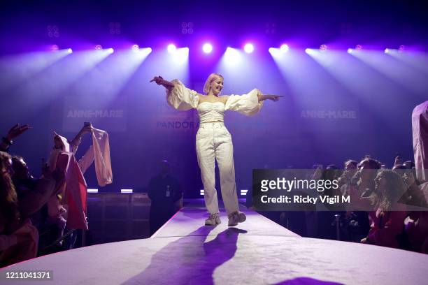 Anne-Marie performs at International Women's Day with Pandora at the Charms for Change event at Exhibition London on March 07, 2020 in London,...
