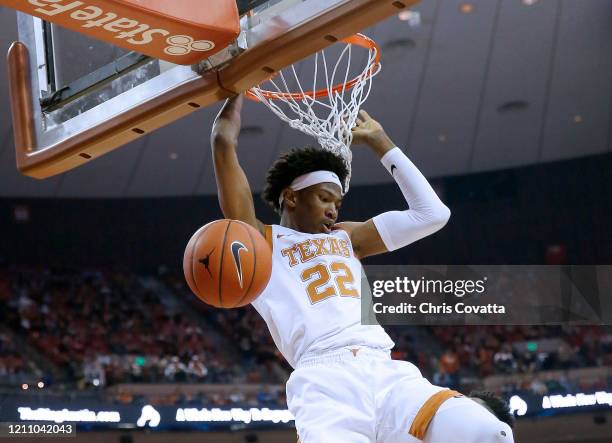 Kai Jones of the Texas Longhorns slam dunks against the Oklahoma State Cowboys at The Frank Erwin Center on March 07, 2020 in Austin, Texas.