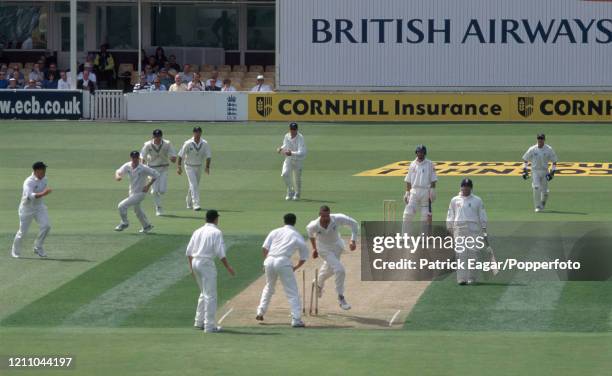 England batsman Mark Butcher is run out for 11 runs by Matthew Horne and Simon Doull of New Zealand during the 1st Test match between England and New...