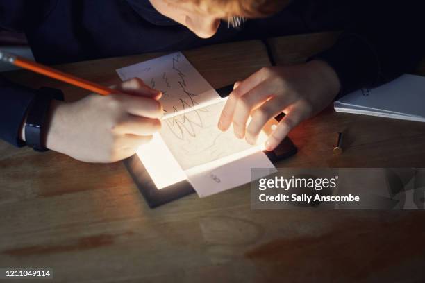 child drawing, making a flip book - daumenkino stock-fotos und bilder