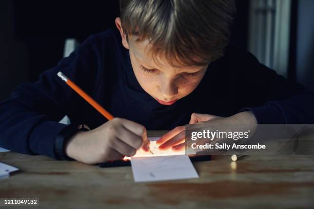 child drawing, making a flip book - daumenkino stock-fotos und bilder