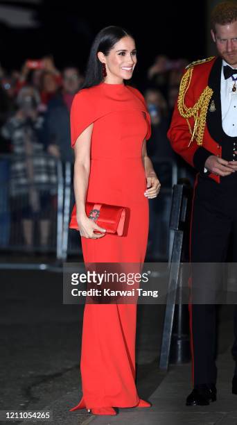 Meghan, Duchess of Sussex accompanied by Prince Harry, Duke of Sussex attends the Mountbatten Festival of Music at Royal Albert Hall on March 07,...