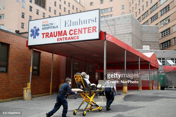 S bring in a patient to Elmhurst Hospital trauma center in New York, United States, n April 26, 2020. Elmhurst Hospital Trauma Center In Queens...