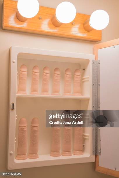 penis dildos representing masturbation and sexuality - penis humour photos et images de collection