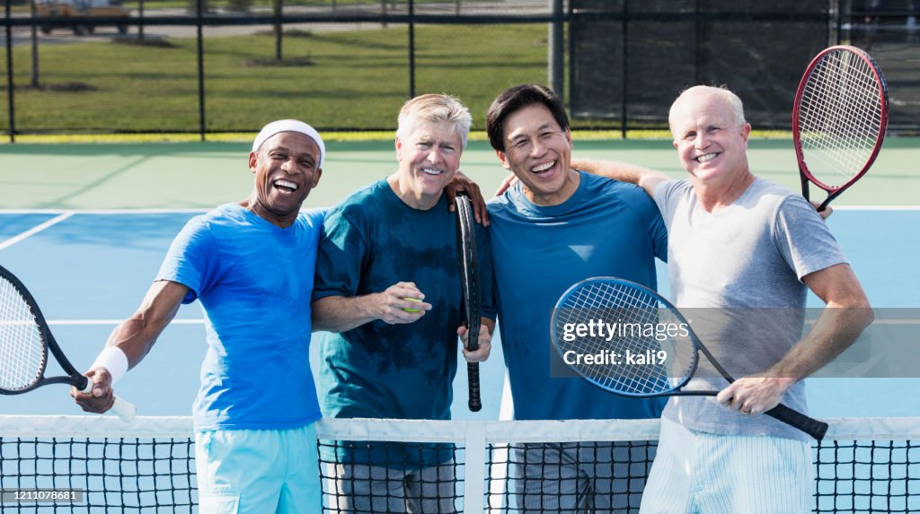 Men having fun playing tennis