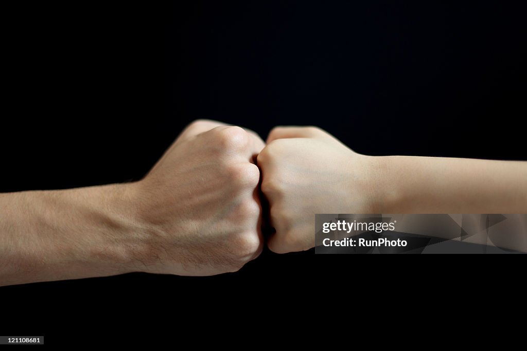 The fist combined with men and women