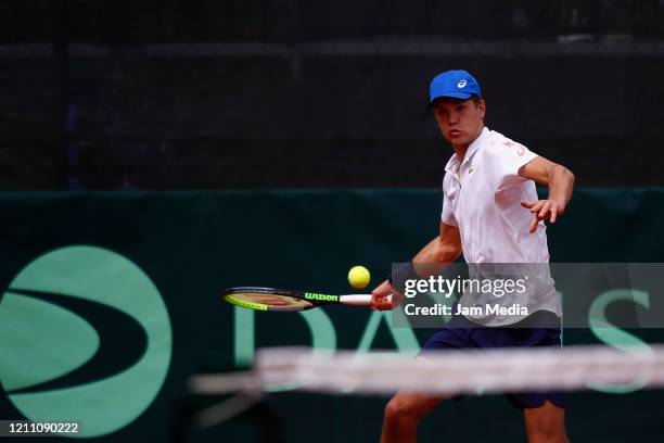 Otto Virtanen of Finland returns the ball as part of day 2 of Davis Cup World Group I Play-offs at Club Deportivo La Asuncion on March 7, 2020 in...