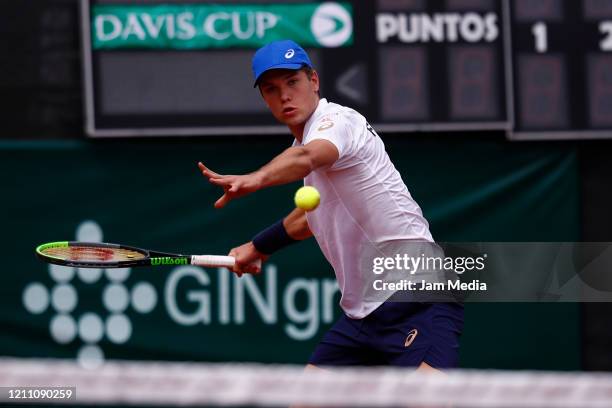 Otto Virtanen of Finland returns the ball as part of day 2 of Davis Cup World Group I Play-offs at Club Deportivo La Asuncion on March 7, 2020 in...