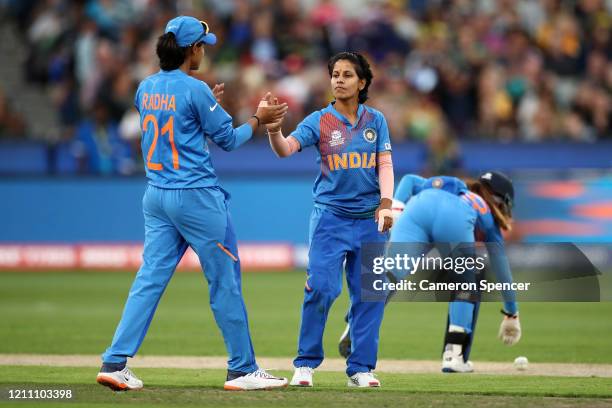 Poonam Yadav of India is congratulated by team mates after taking the wicket of Rachael Haynes of Australia during the ICC Women's T20 Cricket World...