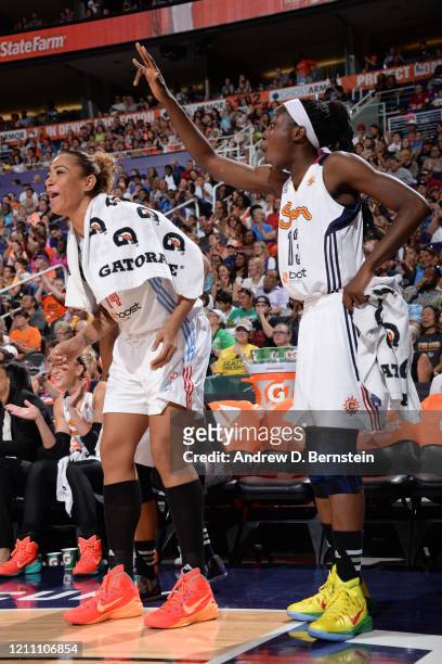 Erika de Souza and Chiney Ogwumike of the Eastern Conference react during the 2014 Boost Mobile WNBA All-Star Game on July 19, 2014 at US Airways...