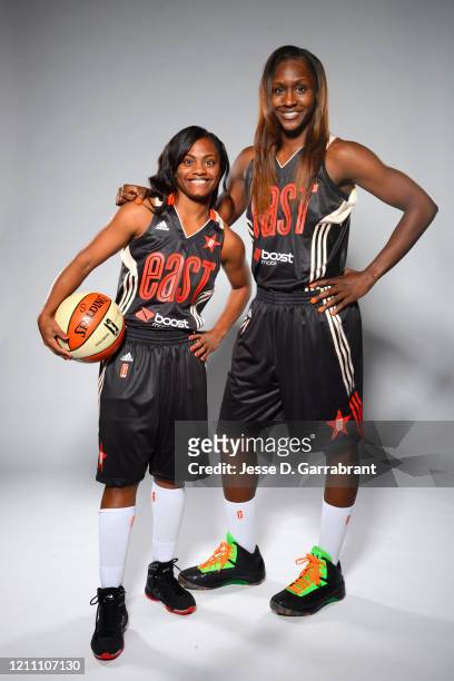 Ivory Latta and Crystal Langhorne pose for a portrait during the WNBA All-Star Media Circuit on July 26, 2013 at Mohegan Sun Arena in Uncasville,...