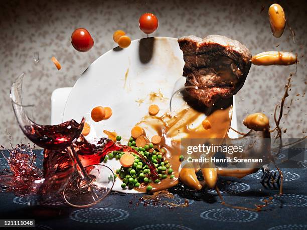 broken wineglass and food plate falling on table - broken plate stock pictures, royalty-free photos & images