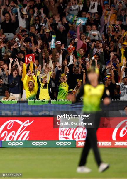 The crowd performs the Mexican Wave during the ICC Women's T20 Cricket World Cup Final match between India and Australia at the Melbourne Cricket...