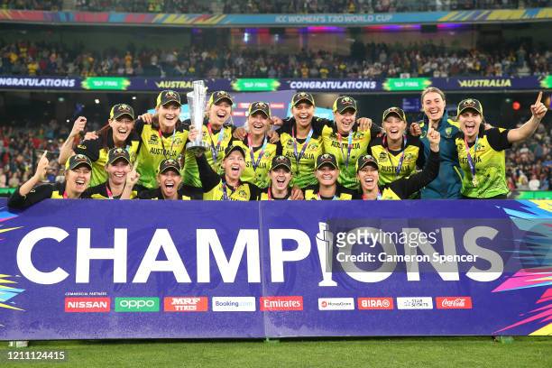Australia celebrate after winning the ICC Women's T20 Cricket World Cup Final match between India and Australia at the Melbourne Cricket Ground on...