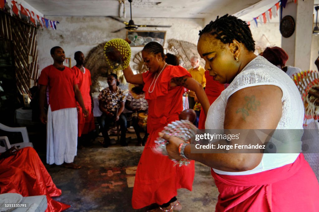 Women dancing during a ceremony in a temple dedicated to the...