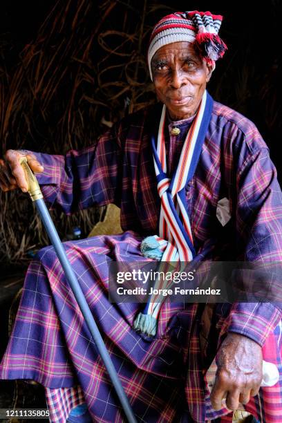 Portrait of an Edda elder dressed in a typical hat and suit.