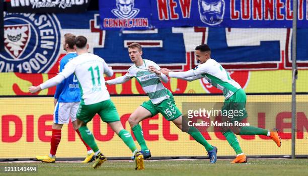 Sebastian Ernst of Greuther Fürth celebrate with his team mats after he scores the opening goal during the Second Bundesliga match between Holstein...