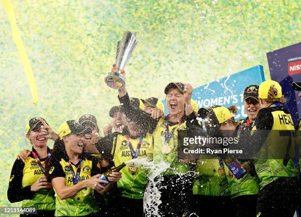 Meg Lanning of Australia lifts the World Cup trophy during the ICC Women's T20 Cricket World Cup Final match between India and Australia at the...
