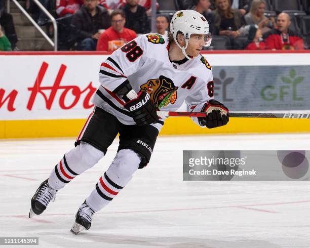 Patrick Kane of the Chicago Blackhawks turns up ice against the Detroit Red Wings during an NHL game at Little Caesars Arena on March 6, 2020 in...